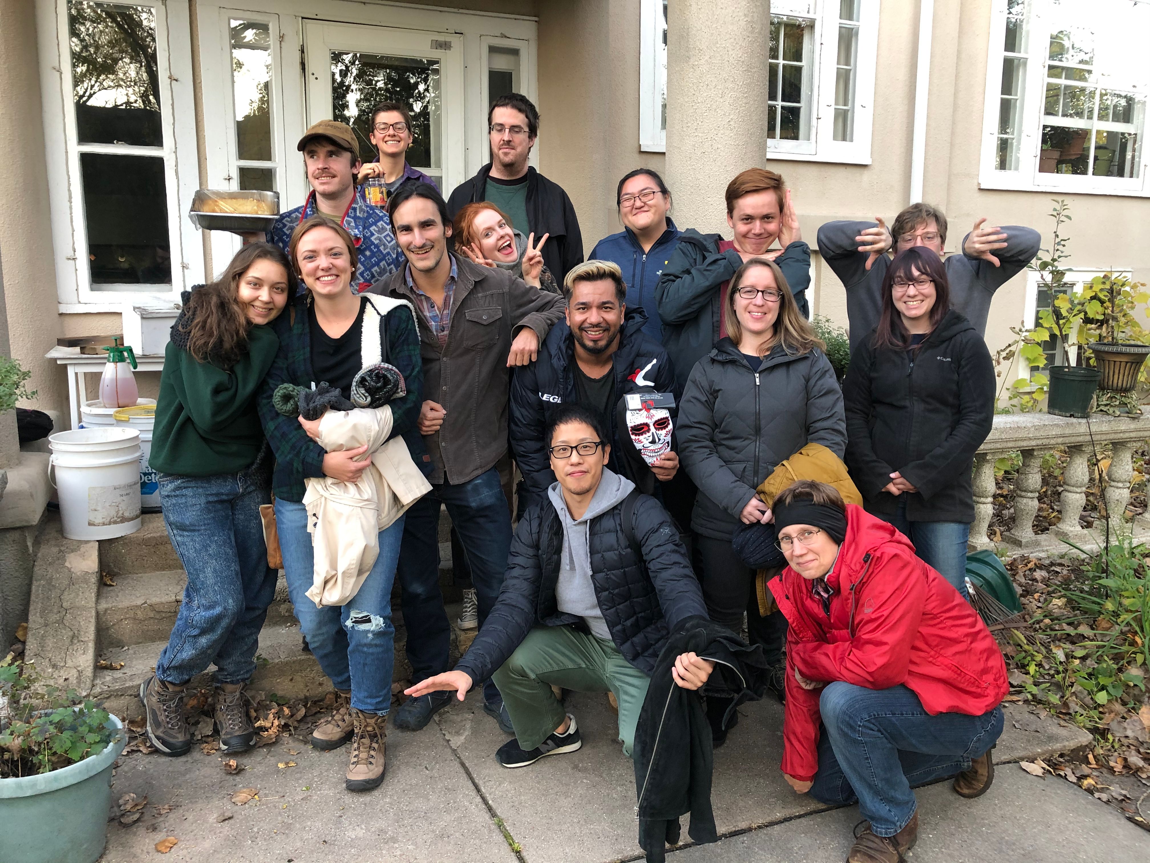 Summiteers and guests pose in front of house before going to a corn maze. (Circa fall 2019)