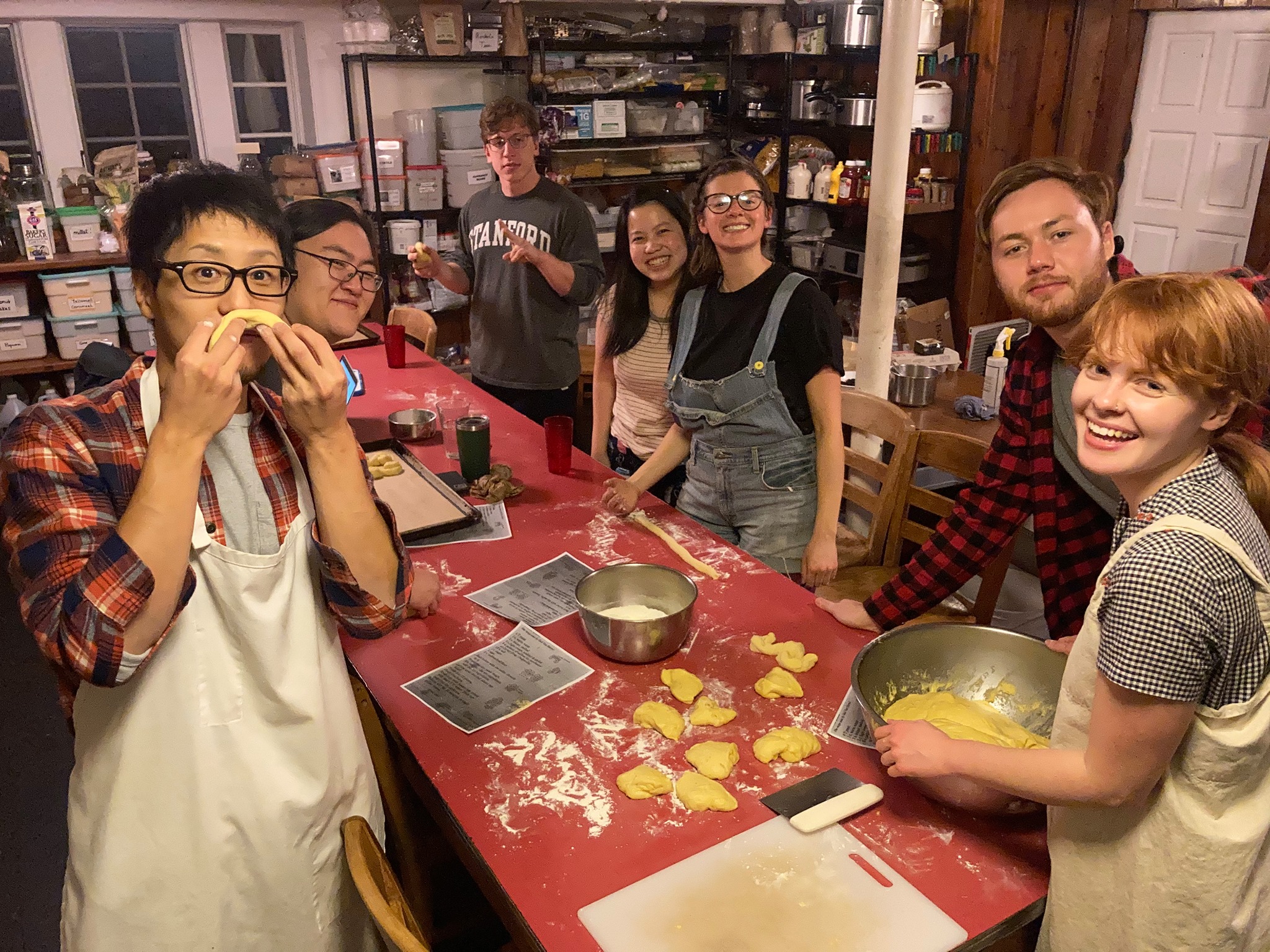Summiteers make Santa Lucia Buns in the dining room. (Circa winter 2020)
