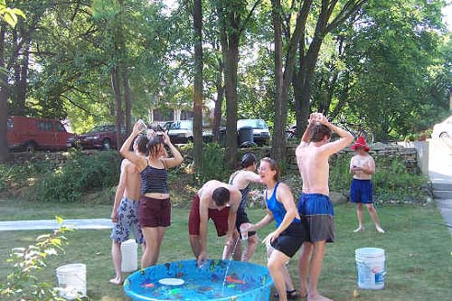 Water party on the lawn with a kiddie pool