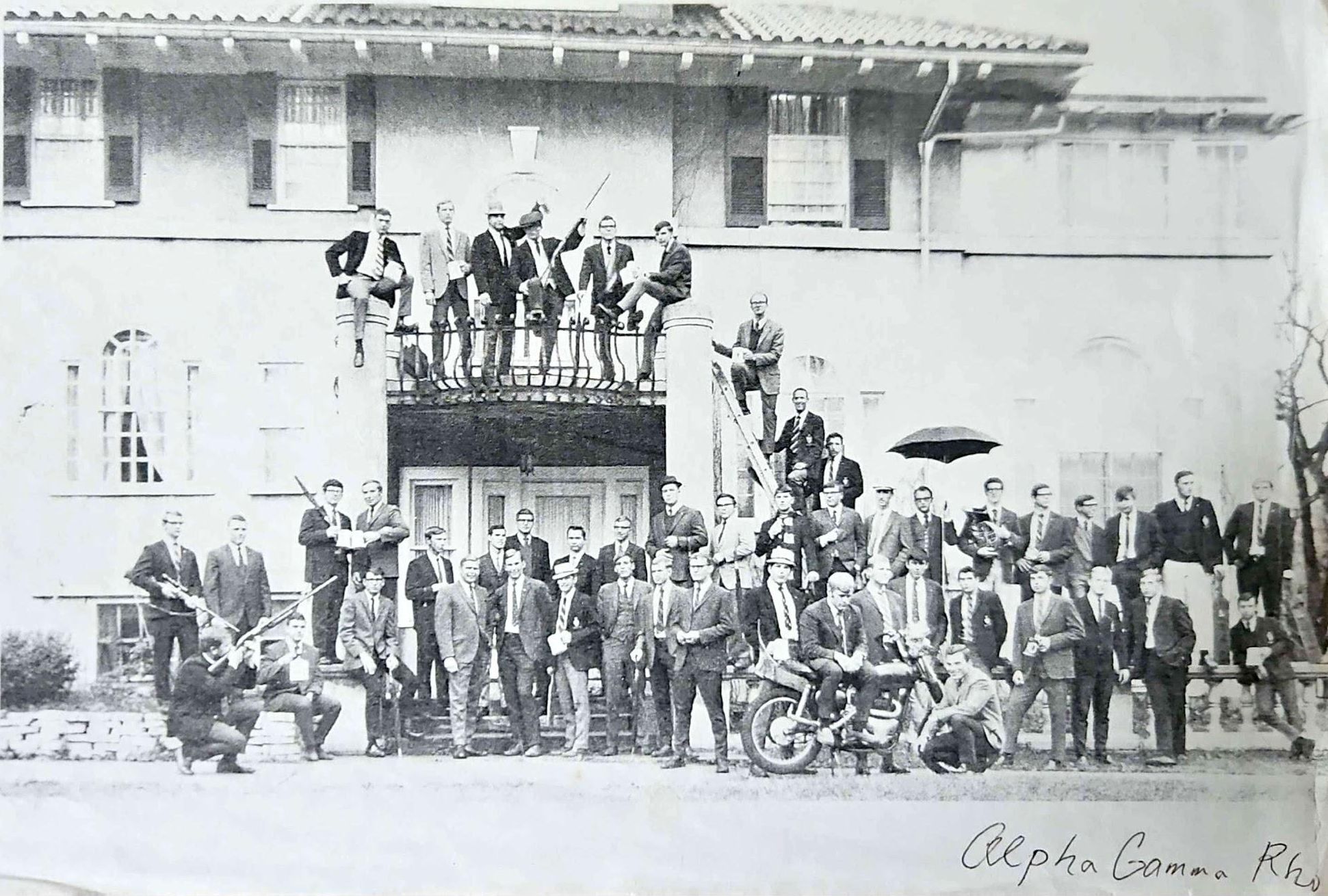 50 members of the agricultural fraternity Alpha Gamma Rho (previous owners of our mansion), posing in front of the main door, October 1968.